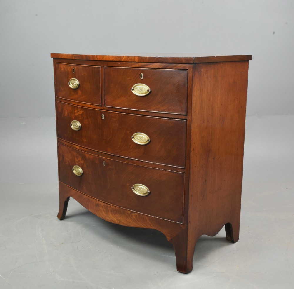 small Georgian mahogany bow front chest of drawers  View II