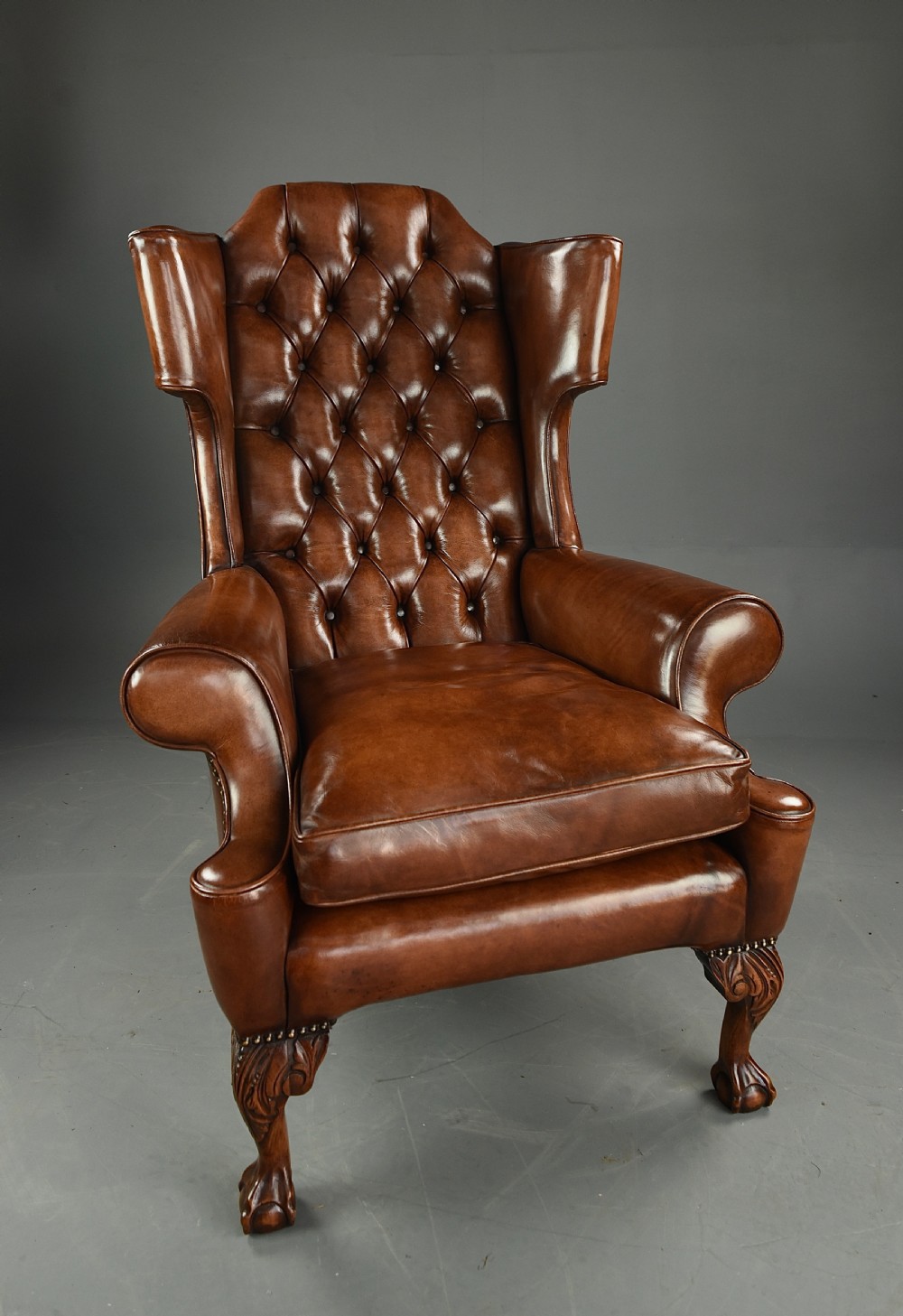 leather deep buttoned wing chair 