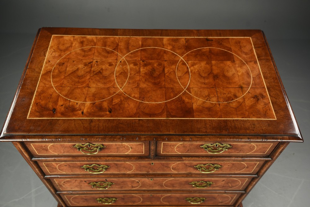 18th century oyster and walnut chest of drawers  View IV