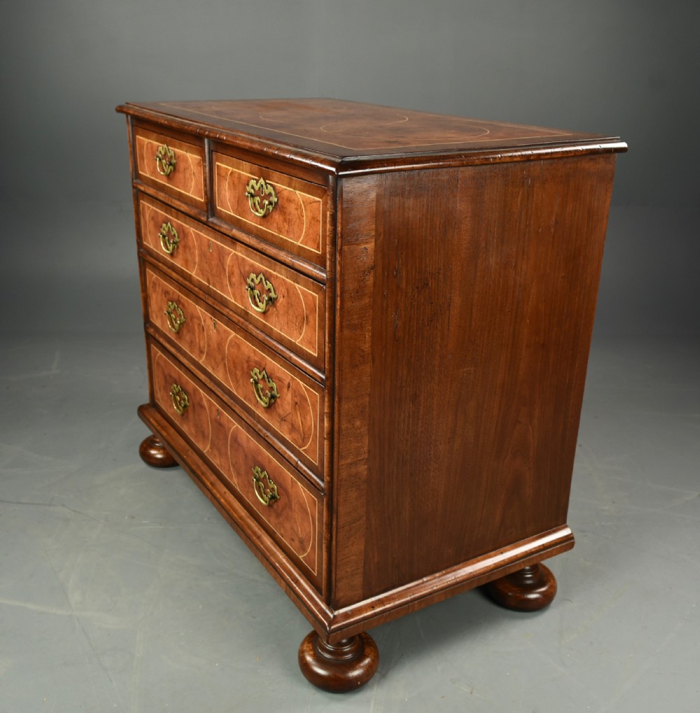 18th century oyster and walnut chest of drawers  View VI