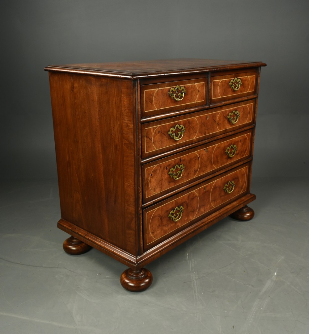 18th century oyster and walnut chest of drawers  View VII