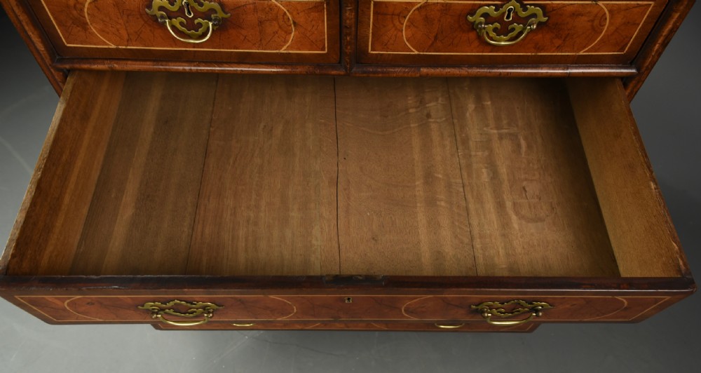 18th century oyster and walnut chest of drawers  View IX