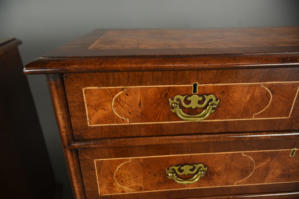 Matched pair of walnut and oyster chests of drawers  View III
