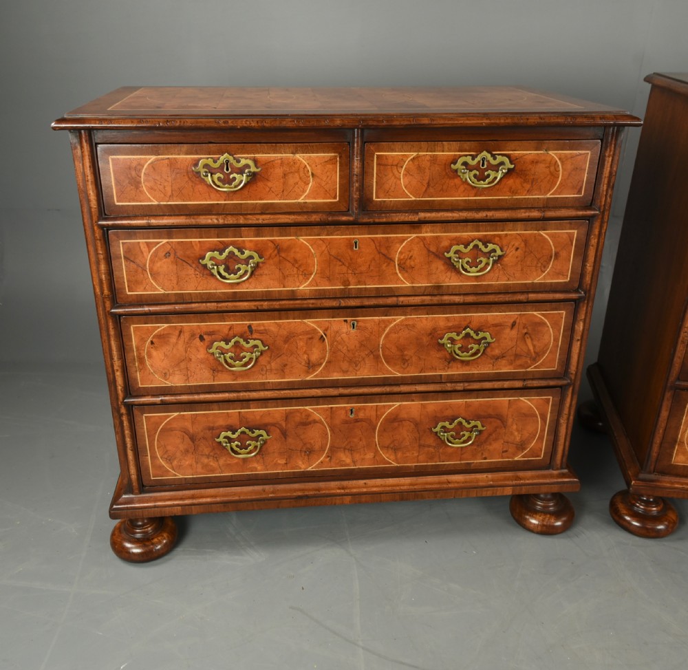Matched pair of walnut and oyster chests of drawers  View V