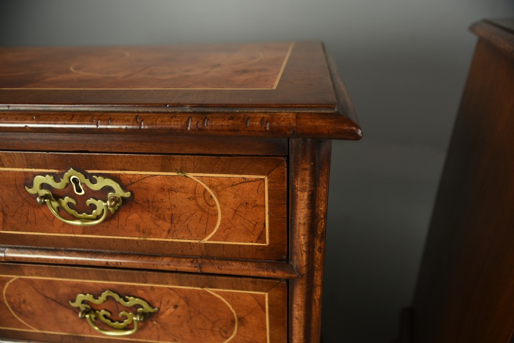 Matched pair of walnut and oyster chests of drawers  View VII