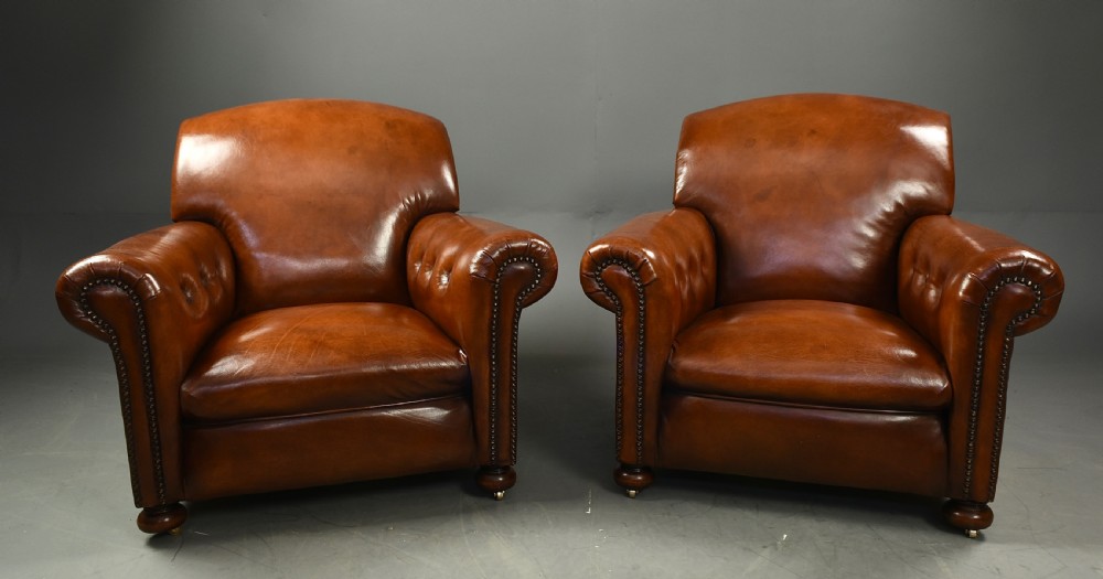 pair of Edwardian leather club arm chairs 
