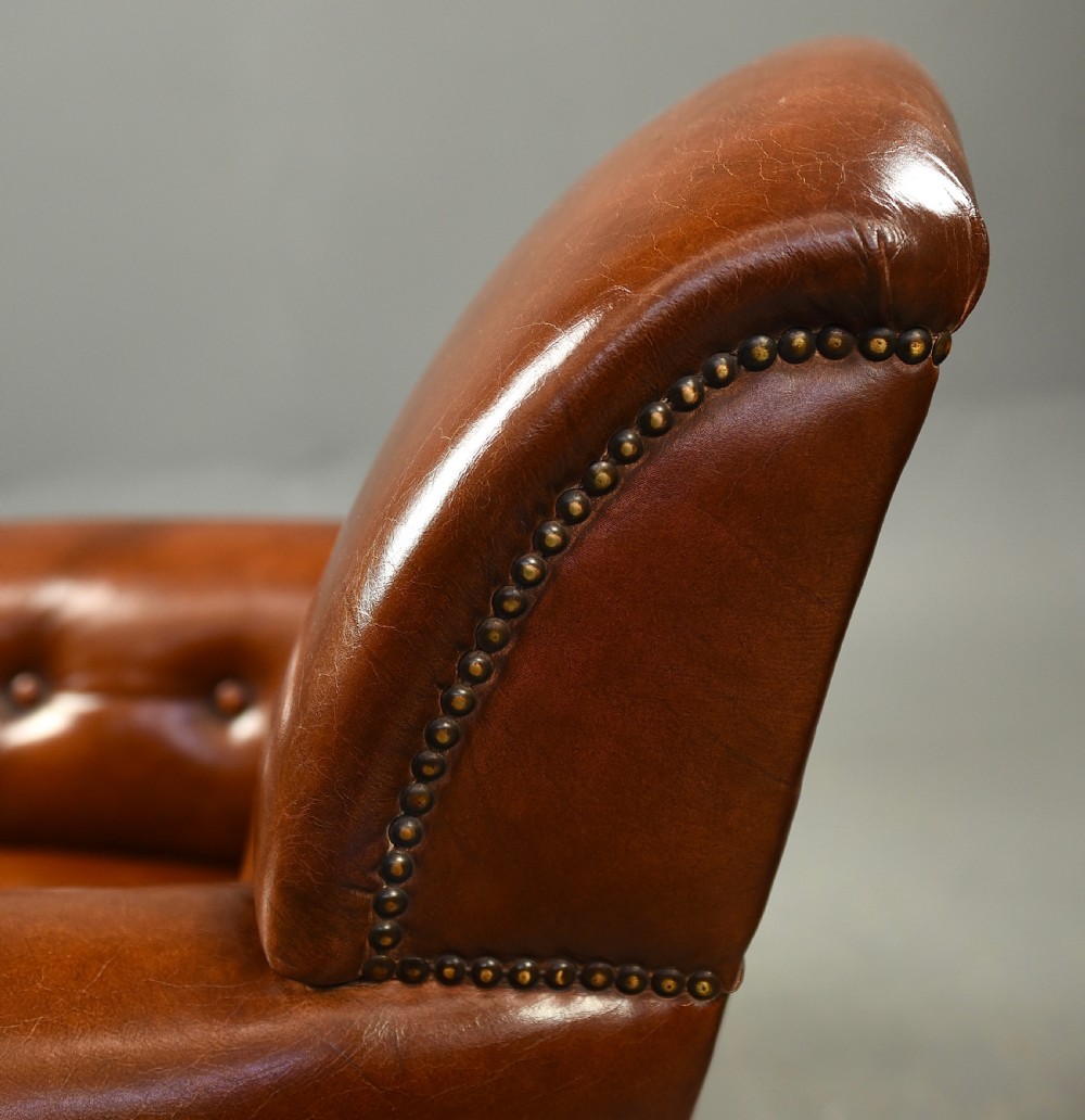 pair of Edwardian leather club arm chairs  View XI