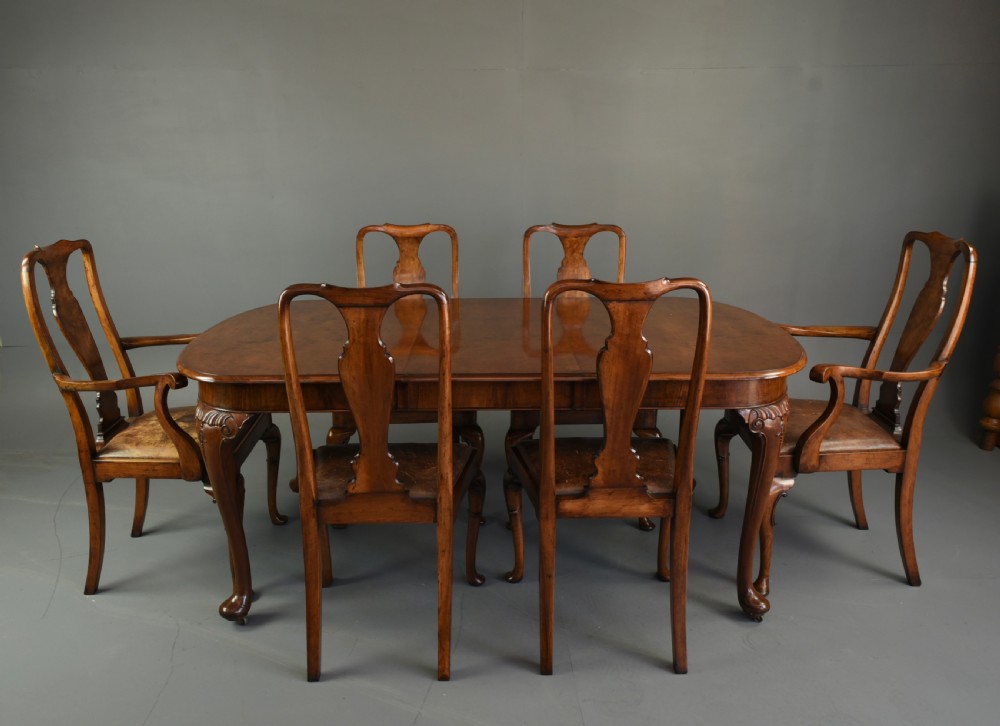 Burr walnut dining table and six chairs 