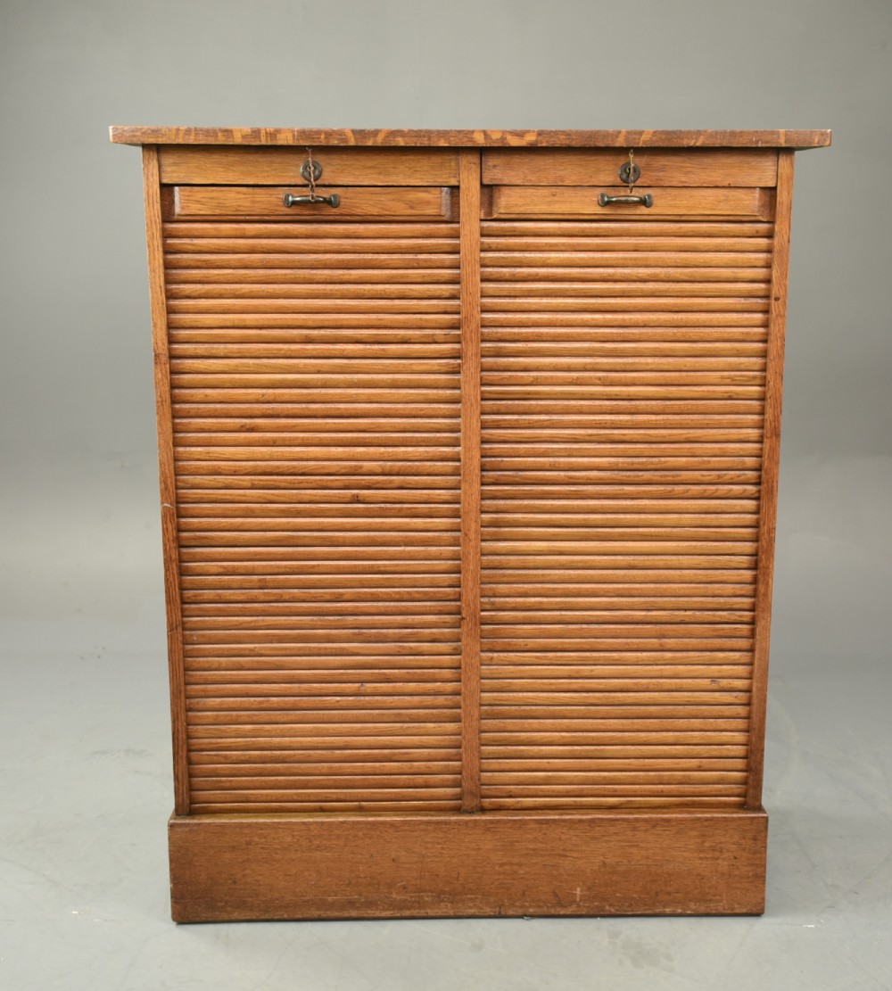 oak double tambour front file cabinet 