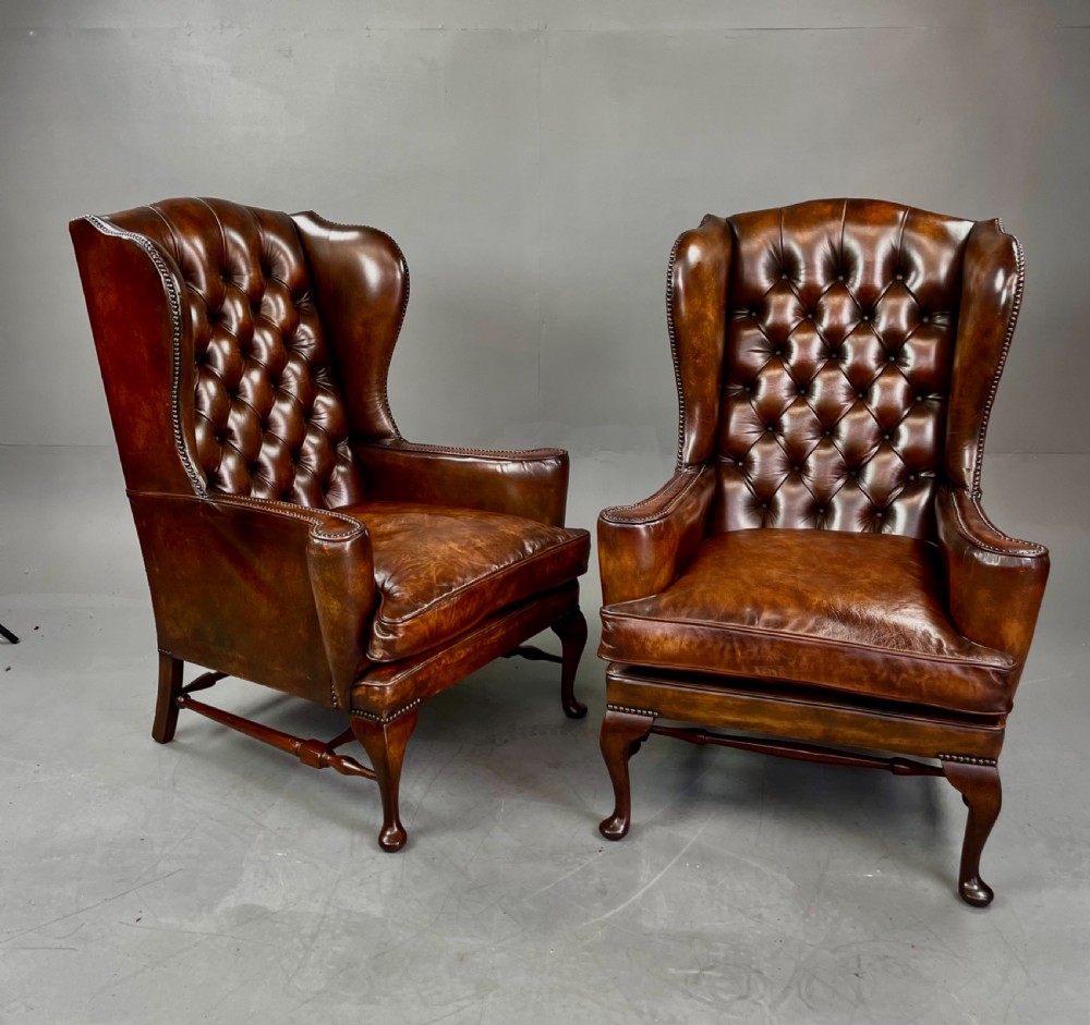 Antique Pair of leather wing chairs 