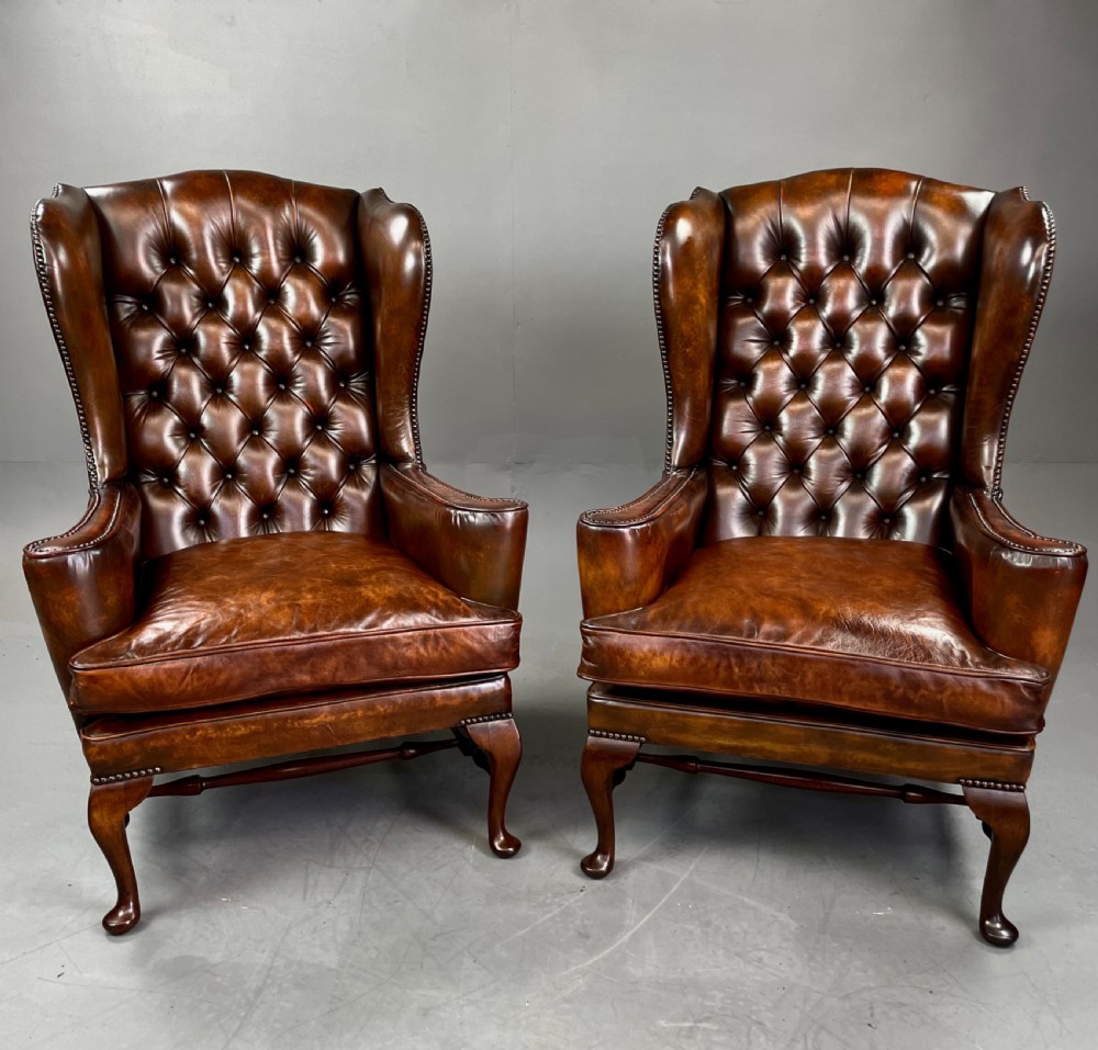 Antique Pair of leather wing chairs  View II