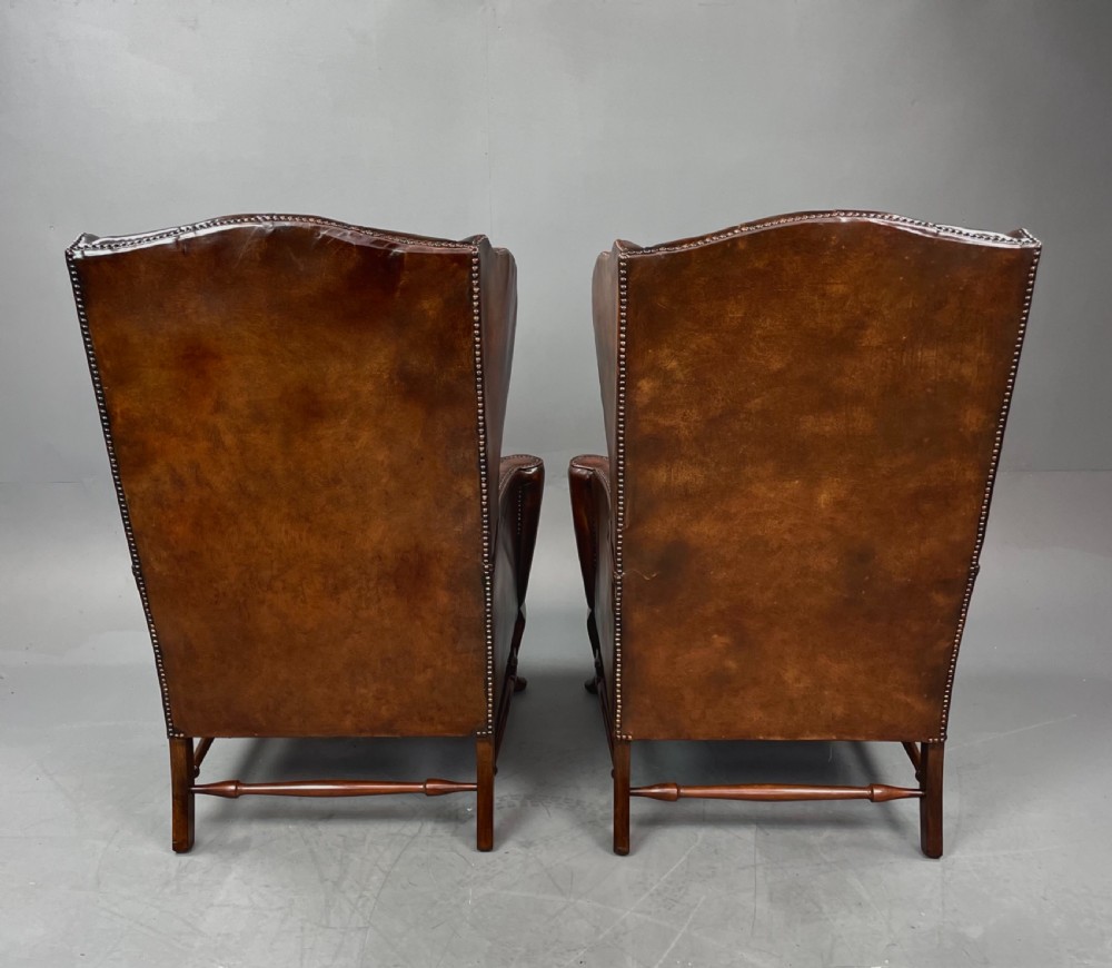 Antique Pair of leather wing chairs  View VI