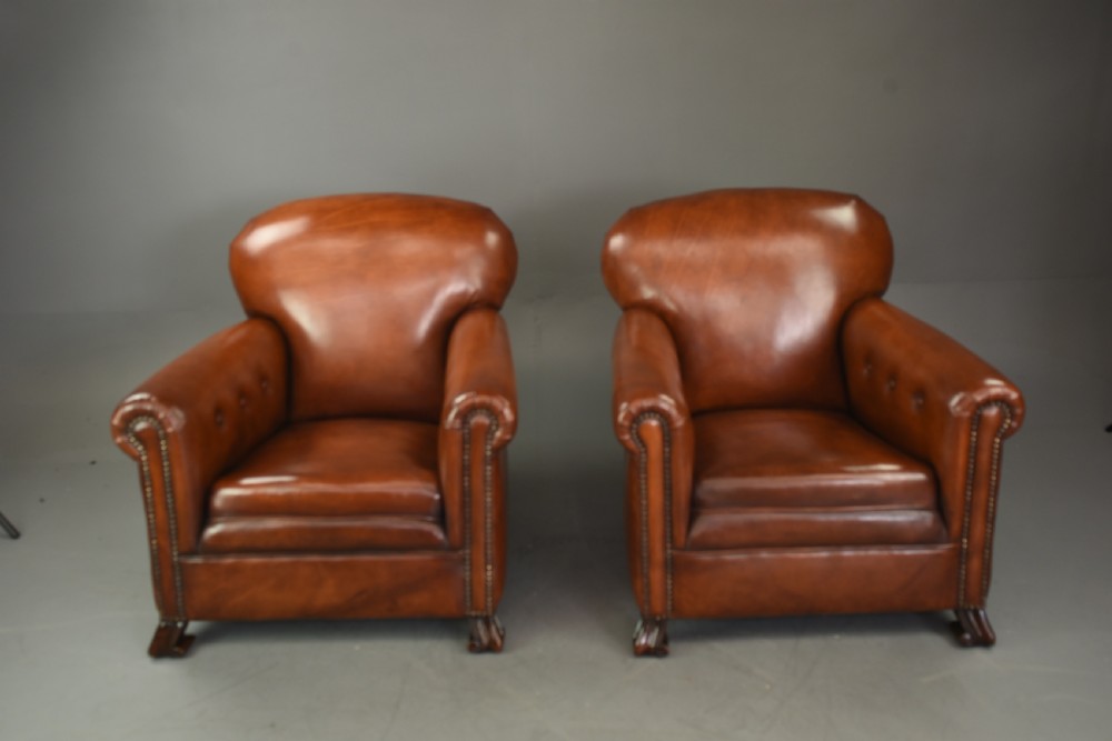 Antique pair of leather club chairs 