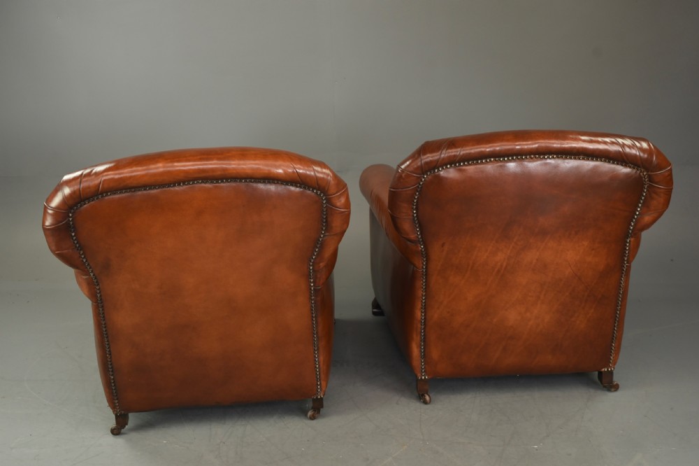 Antique pair of leather club chairs  View VI