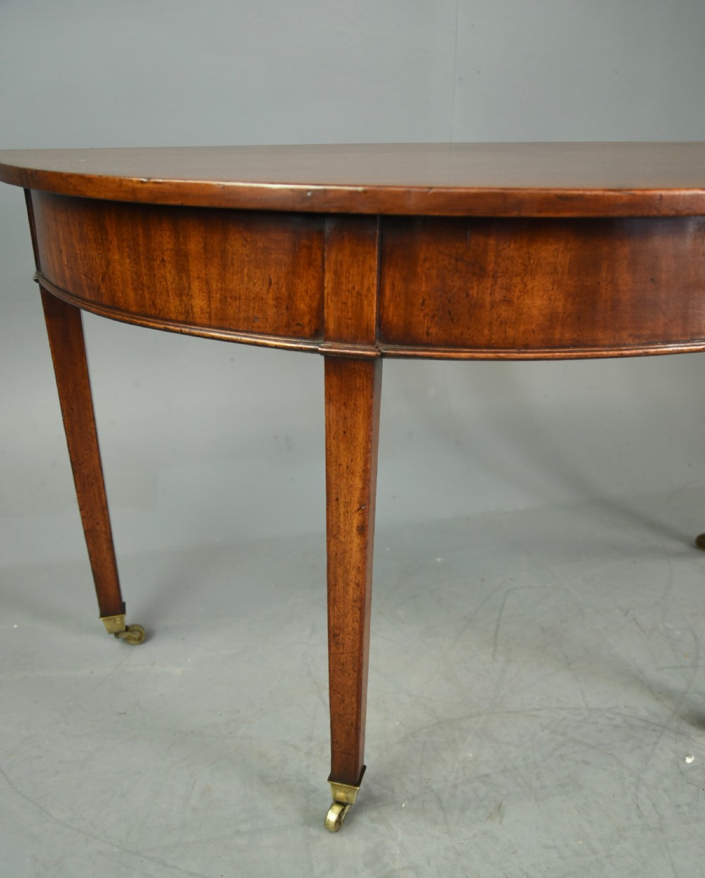 pair of Georgian mahogany demi lune console tables  View V