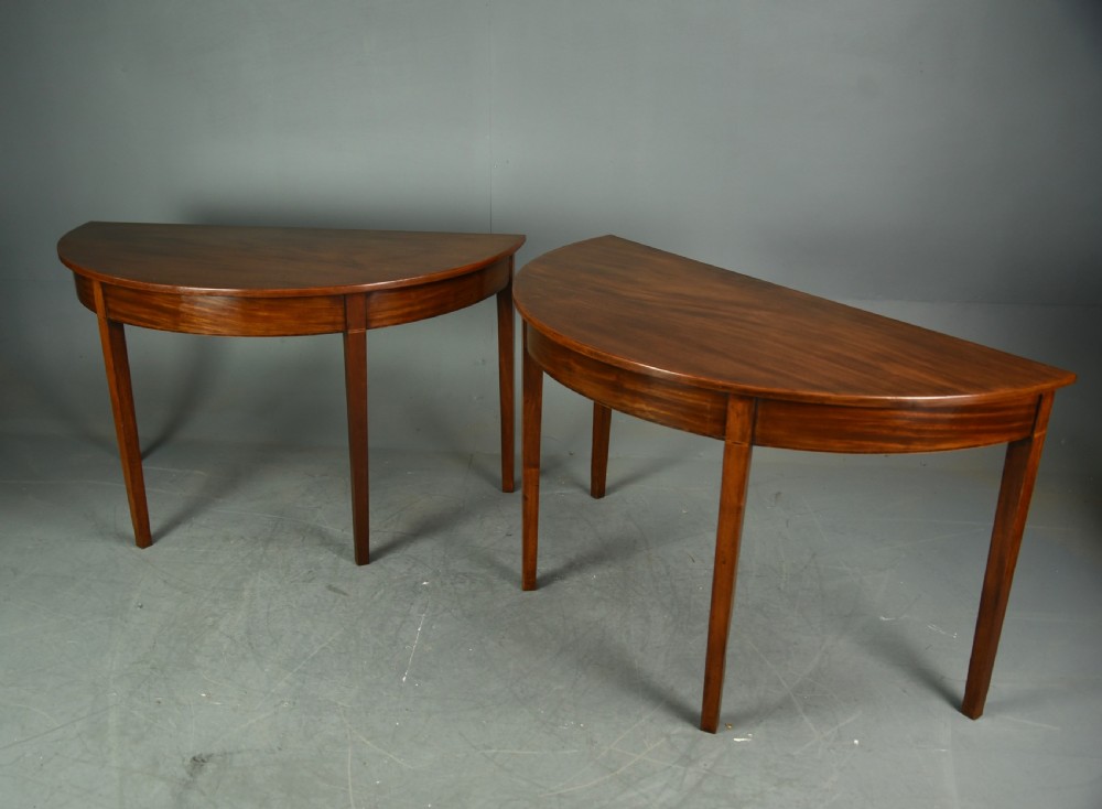 fine pair of Georgian mahogany demi lune console tables 