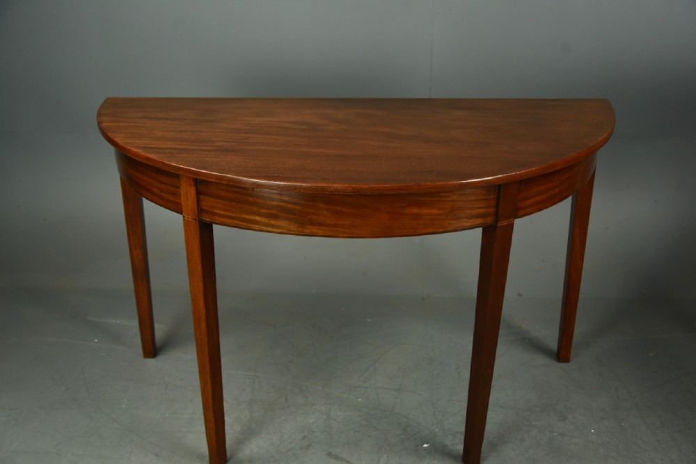 fine pair of Georgian mahogany demi lune console tables  View II