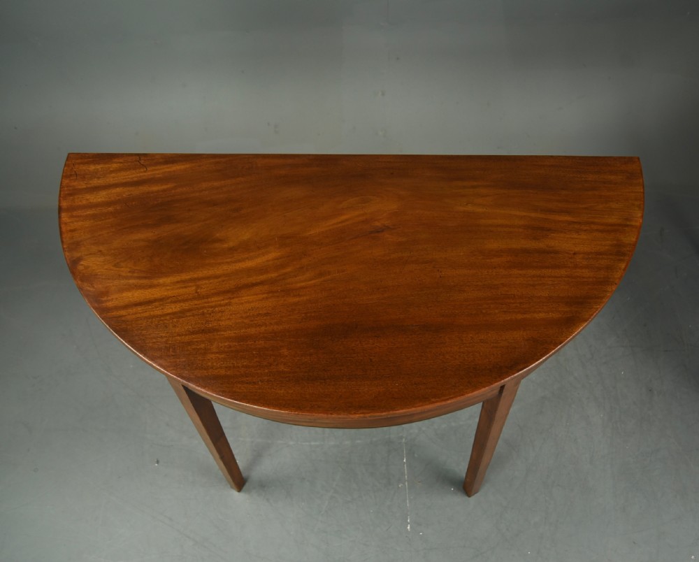 fine pair of Georgian mahogany demi lune console tables  View IV