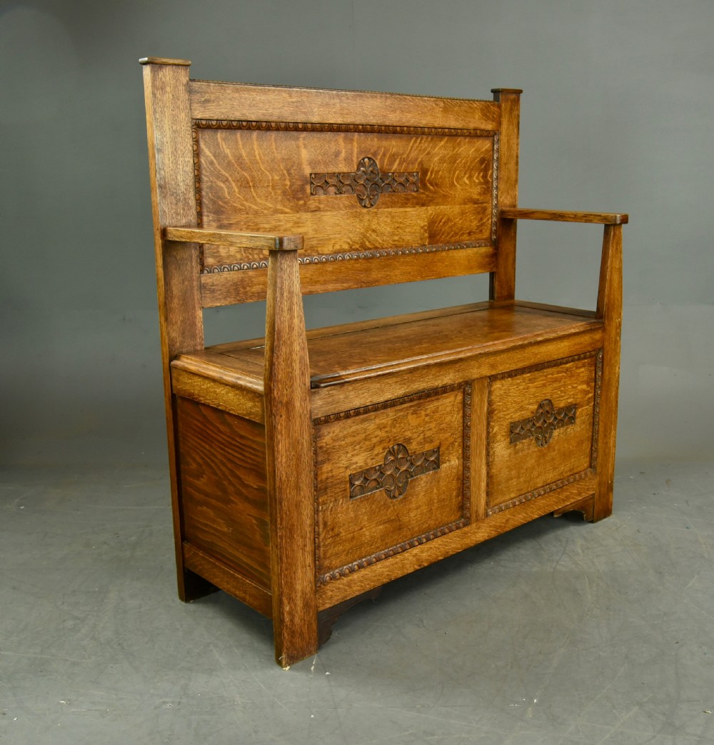 Arts and crafts carved oak hall bench   View IV