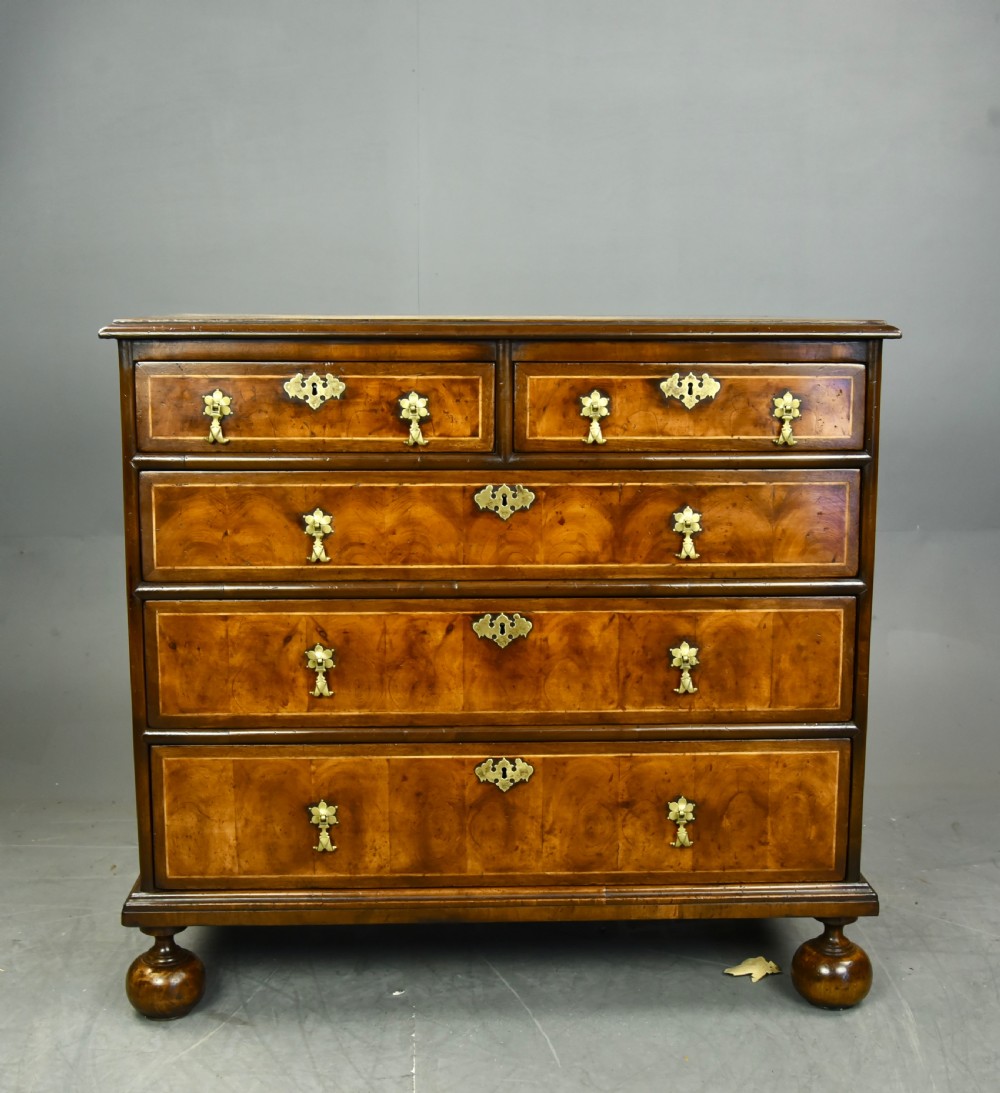 18th century oyster and walnut chest of drawers  View II