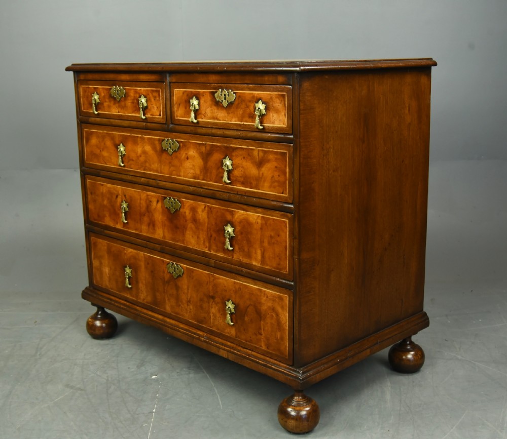 18th century oyster and walnut chest of drawers  View IV