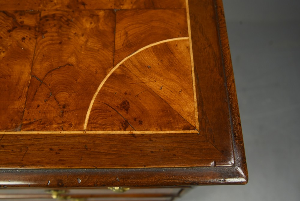 18th century oyster and walnut chest of drawers  View VIII