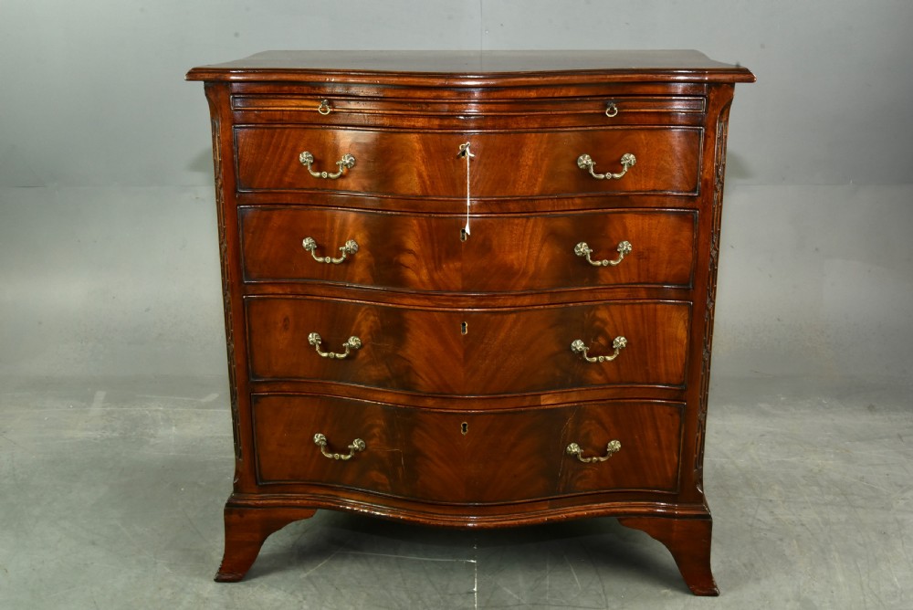19th century small serpentine mahogany bachelors chest 