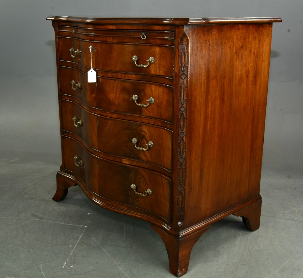 19th century small serpentine mahogany bachelors chest  View II