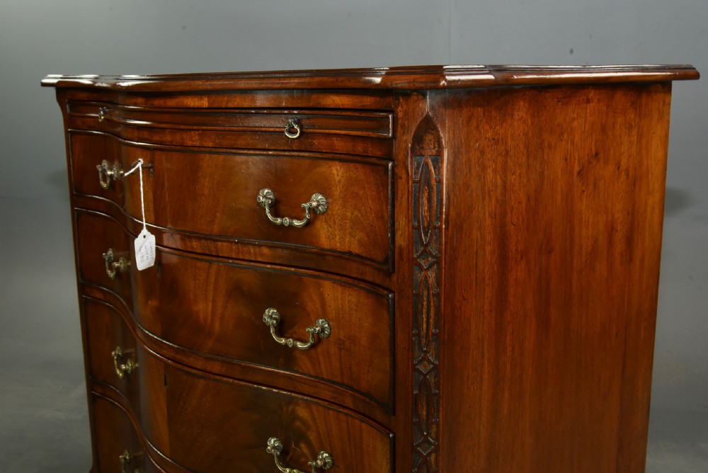 19th century small serpentine mahogany bachelors chest  View V
