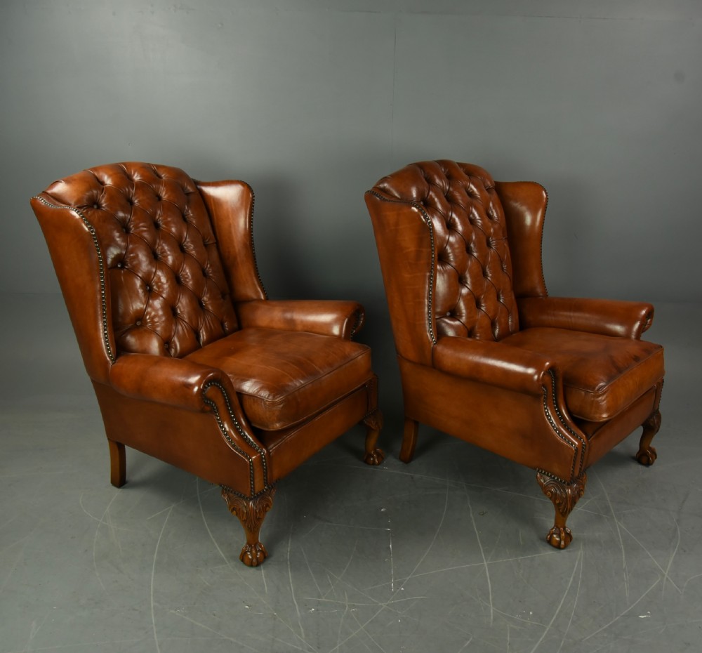 Pair of leather wing chairs  View II