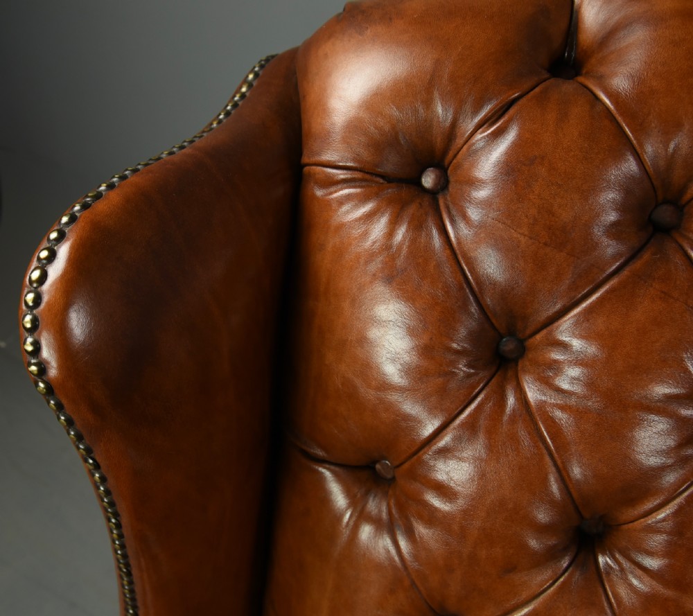 Pair of leather wing chairs  View IX