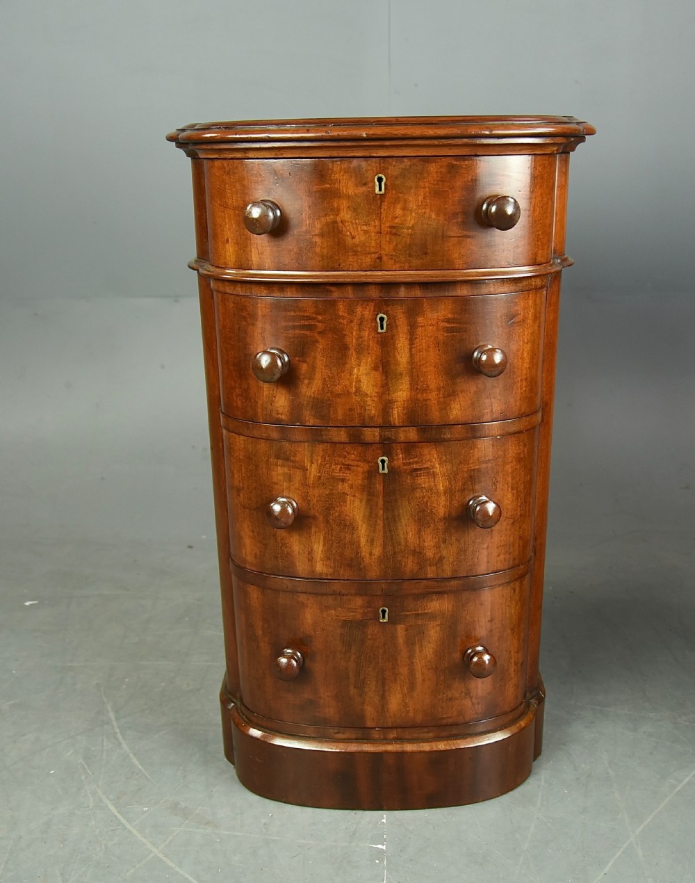 Pair of Victorian bow front mahogany bedside chests of drawers  View IV