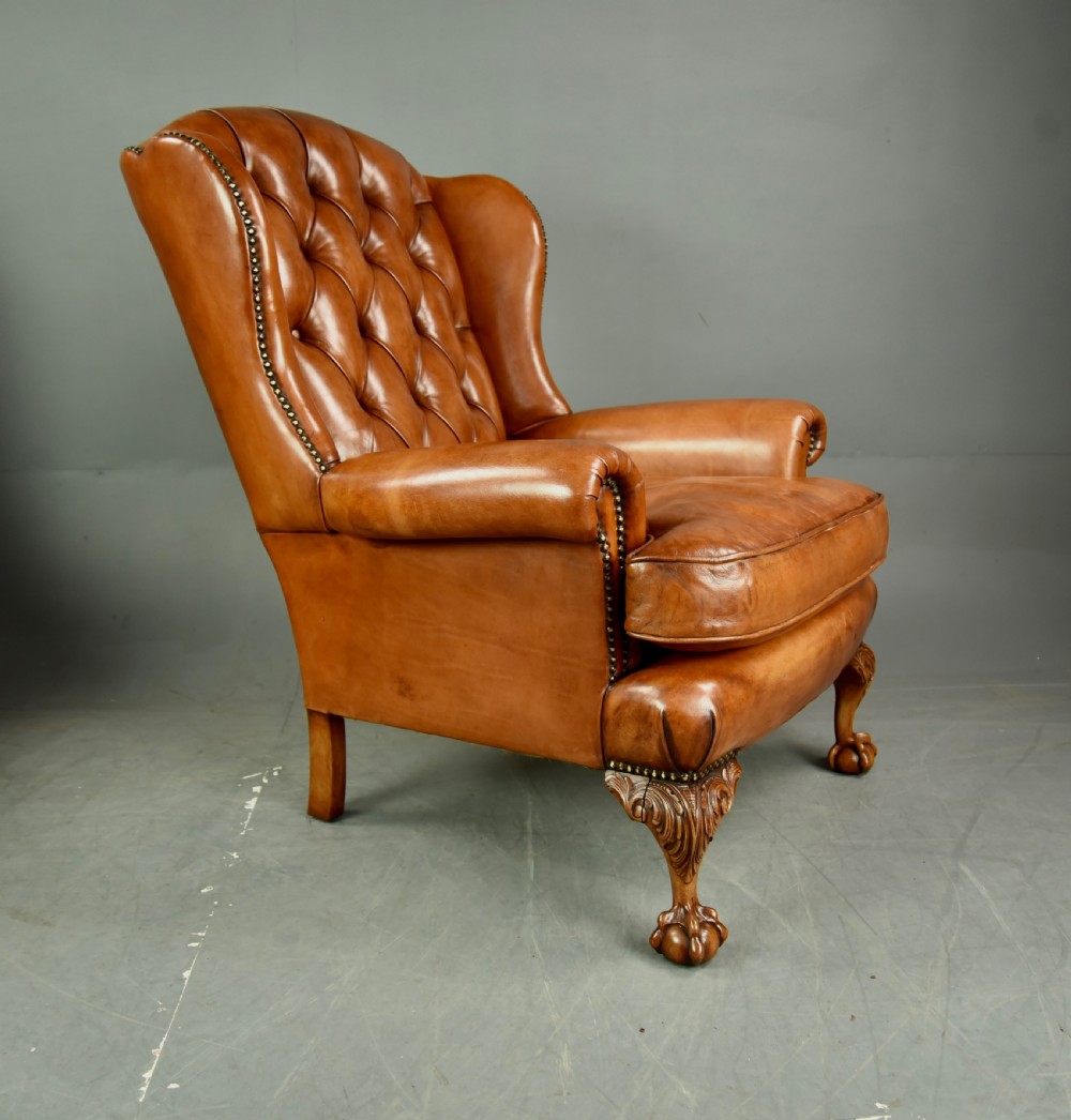 Antique pair of leather wing chairs  View II