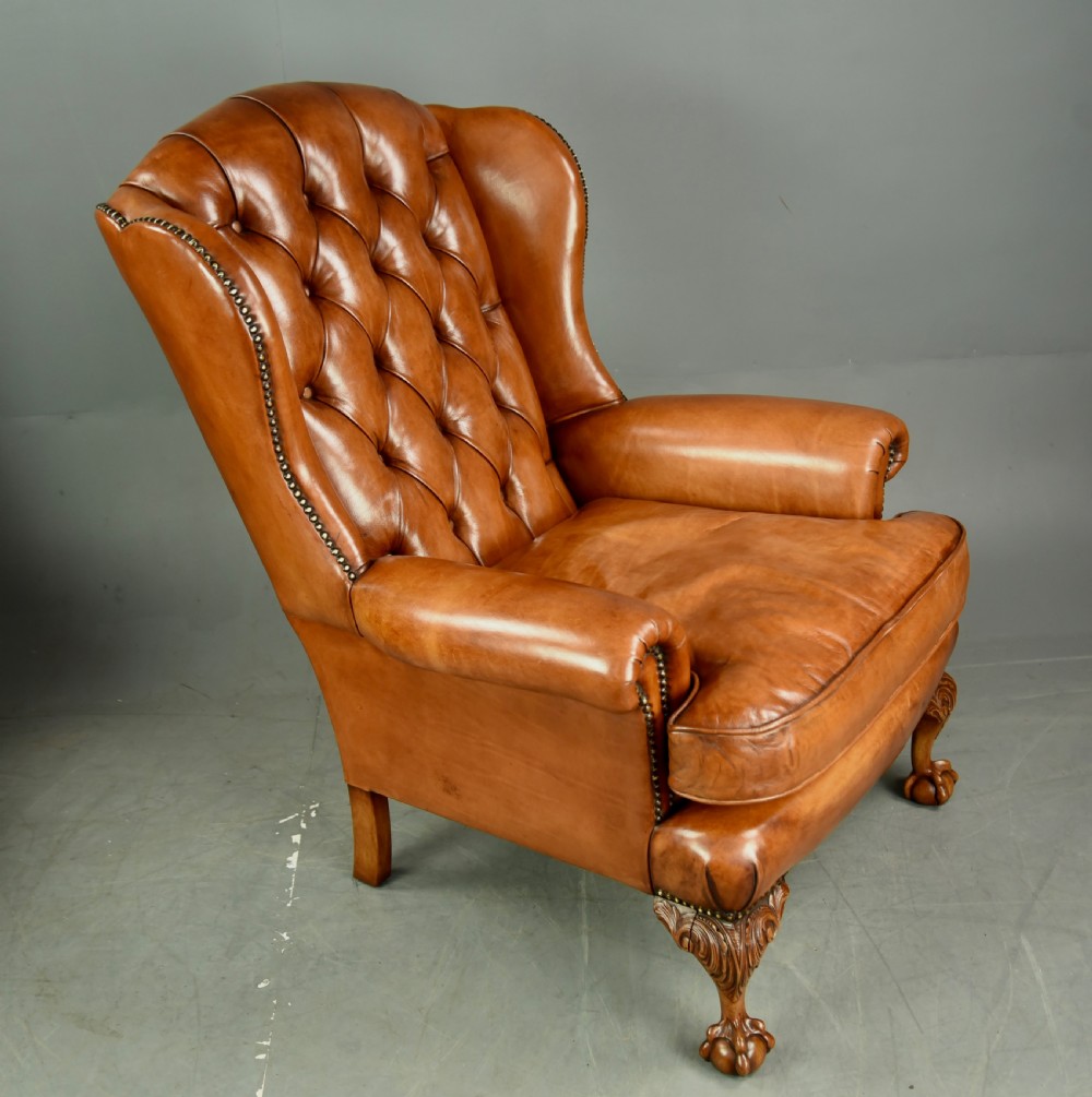 Antique pair of leather wing chairs  View III