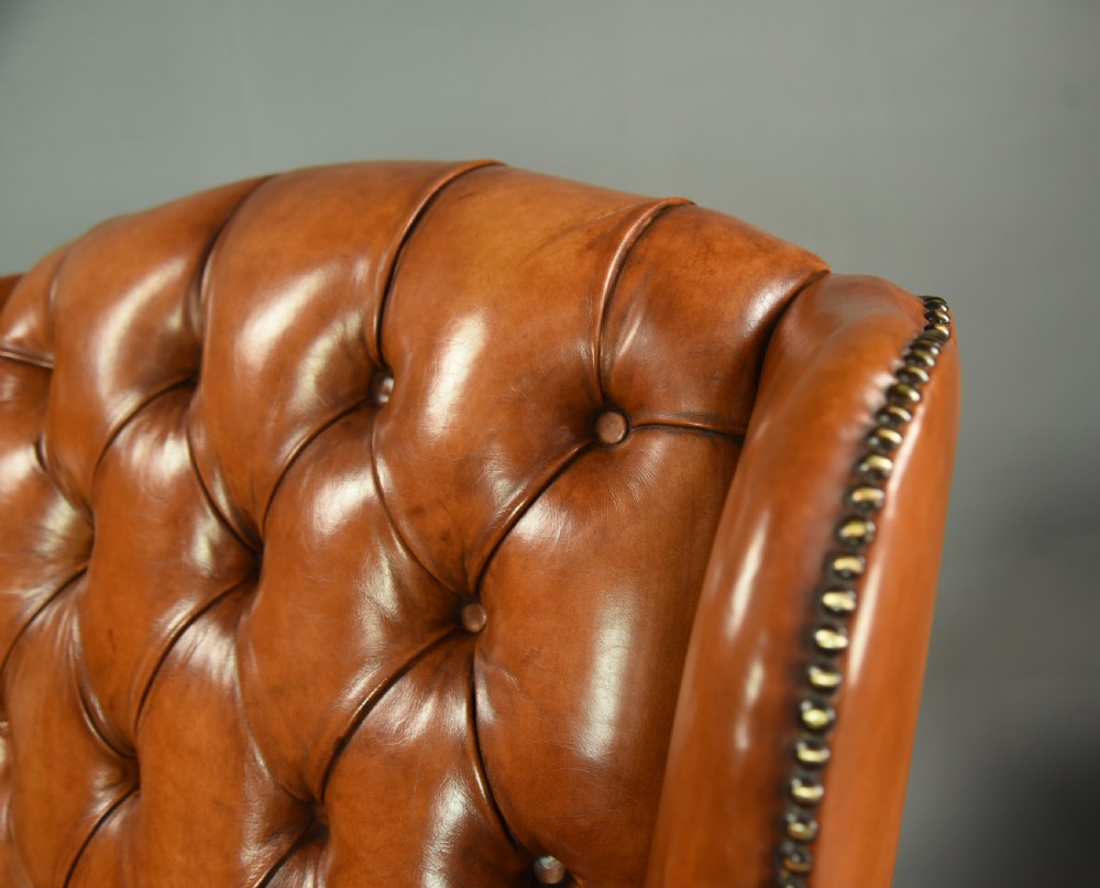Antique pair of leather wing chairs  View VI