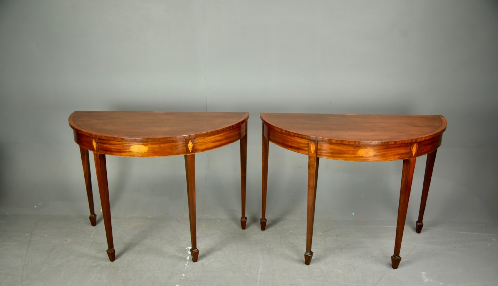 Pair of 19th century mahogany Demi lune console tables  View II