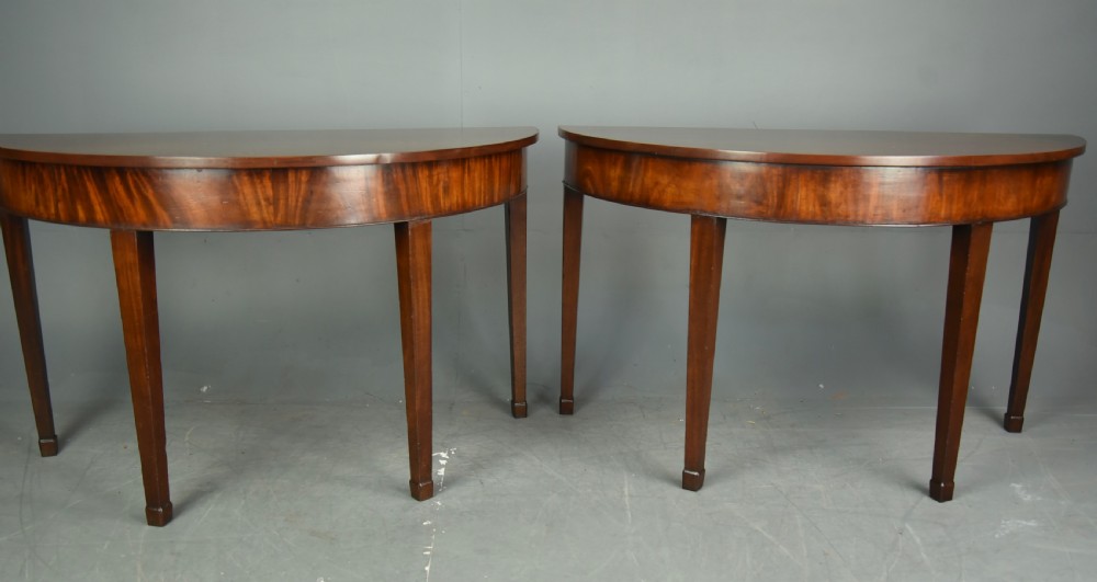 Pair of Georgian mahogany Demi lune console tables 