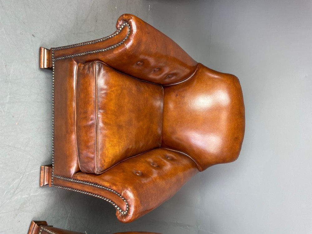 pair of leather arm chairs circa 1900  View IV