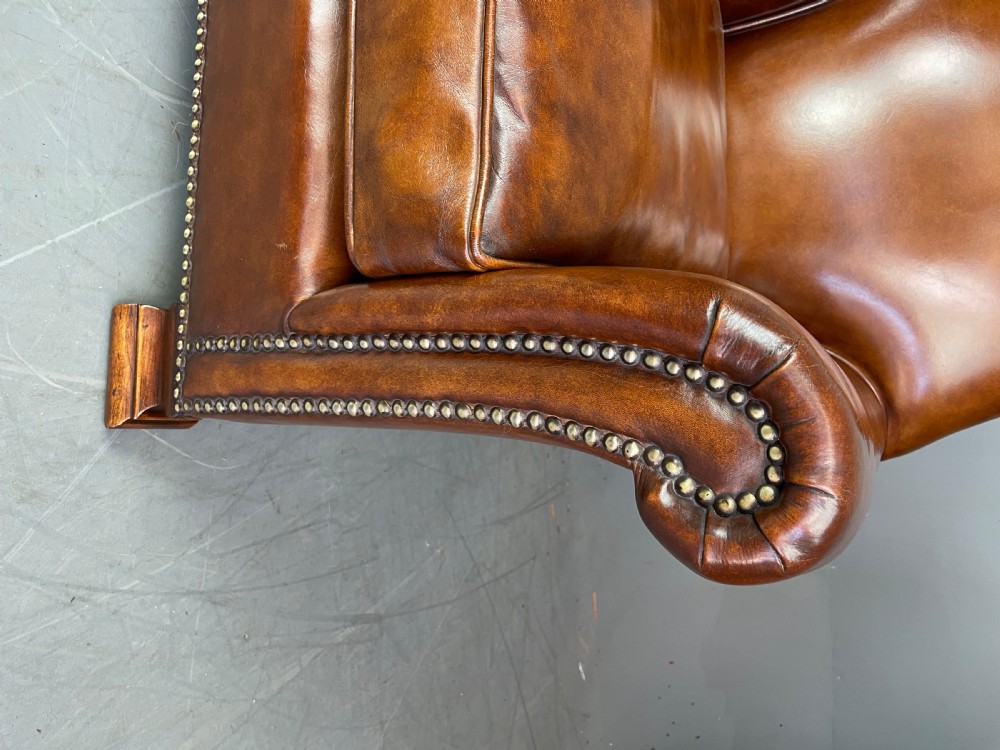 pair of leather arm chairs circa 1900  View VI