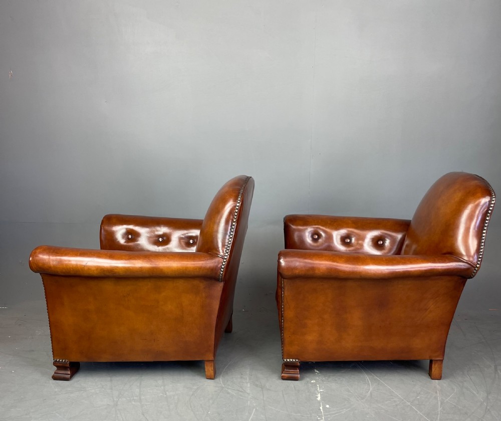 pair of leather arm chairs circa 1900  View IX