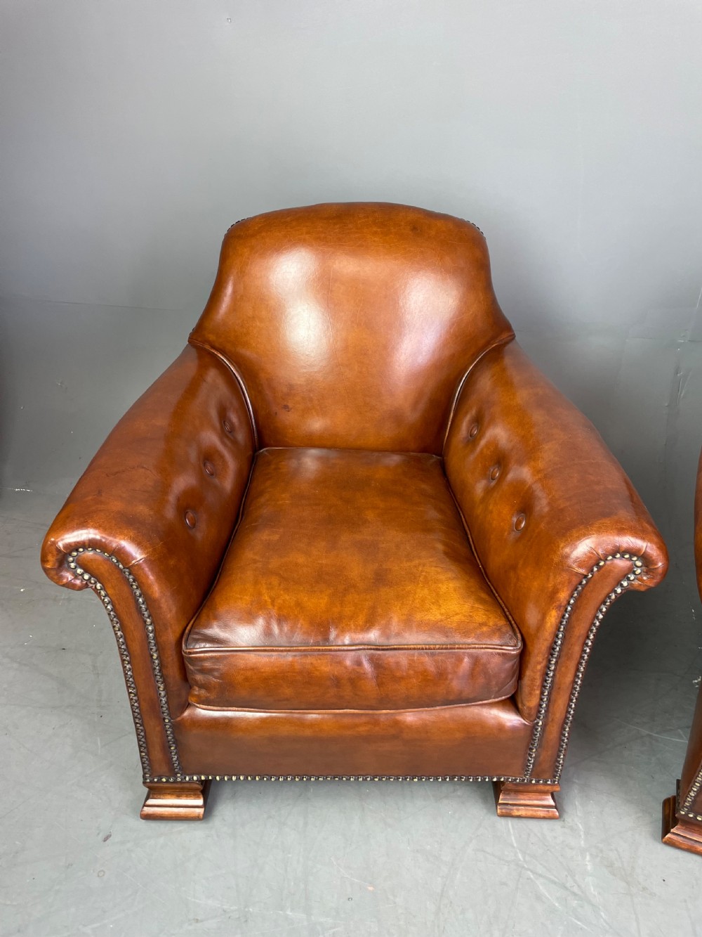 pair of leather arm chairs circa 1900  View X
