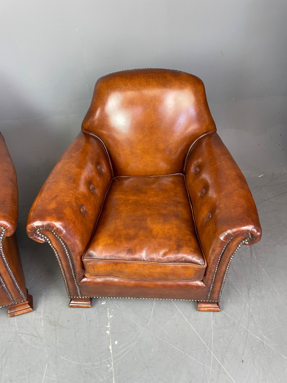 pair of leather arm chairs circa 1900  View XI