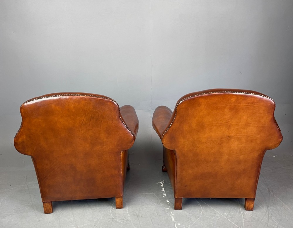 pair of leather arm chairs circa 1900  View XIV