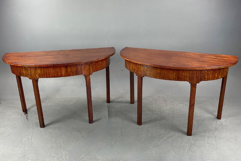 Pair of Georgian mahogany demi lune console tables  View II