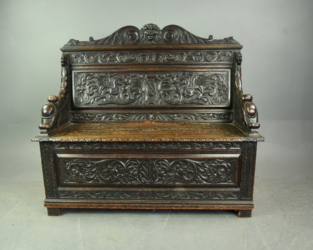 Carved oak hall bench 
