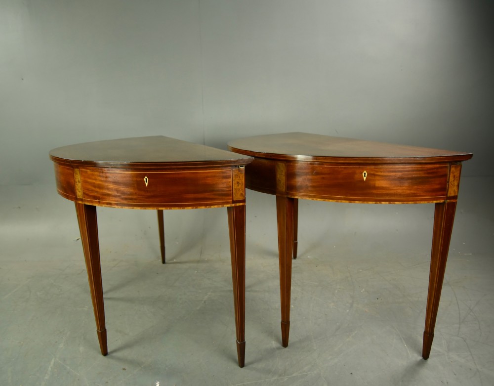 Pair of Georgian mahogany demi lune console tables  View II