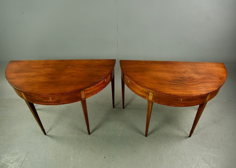 Pair of Georgian mahogany demi lune console tables  View III