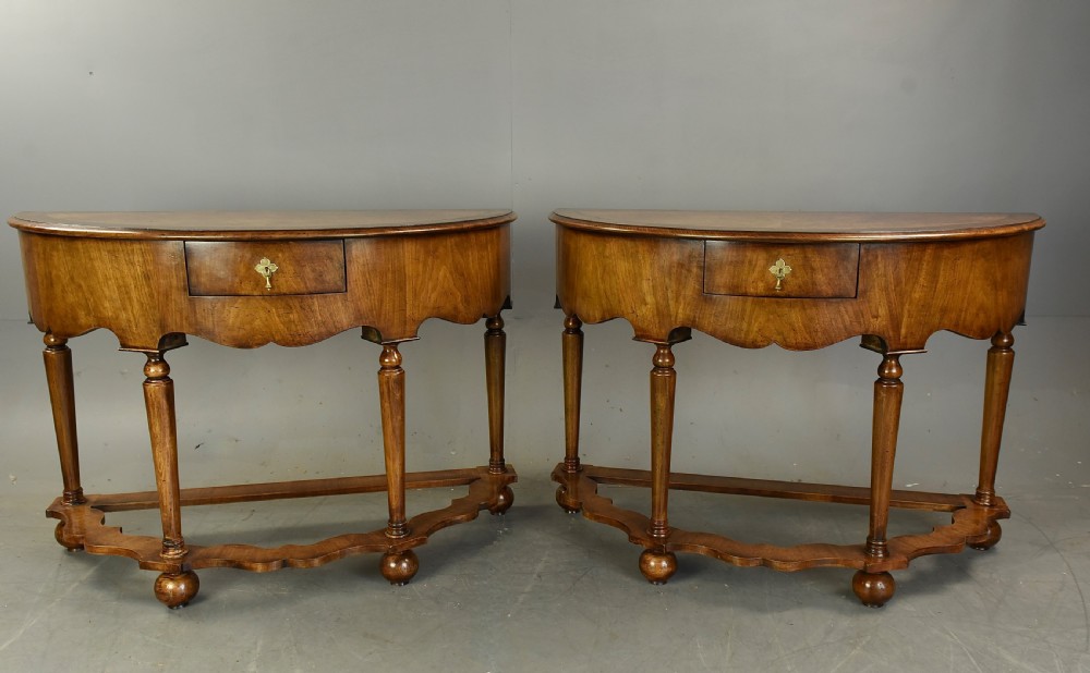 Fine pair of walnut Demi lune console tables 
