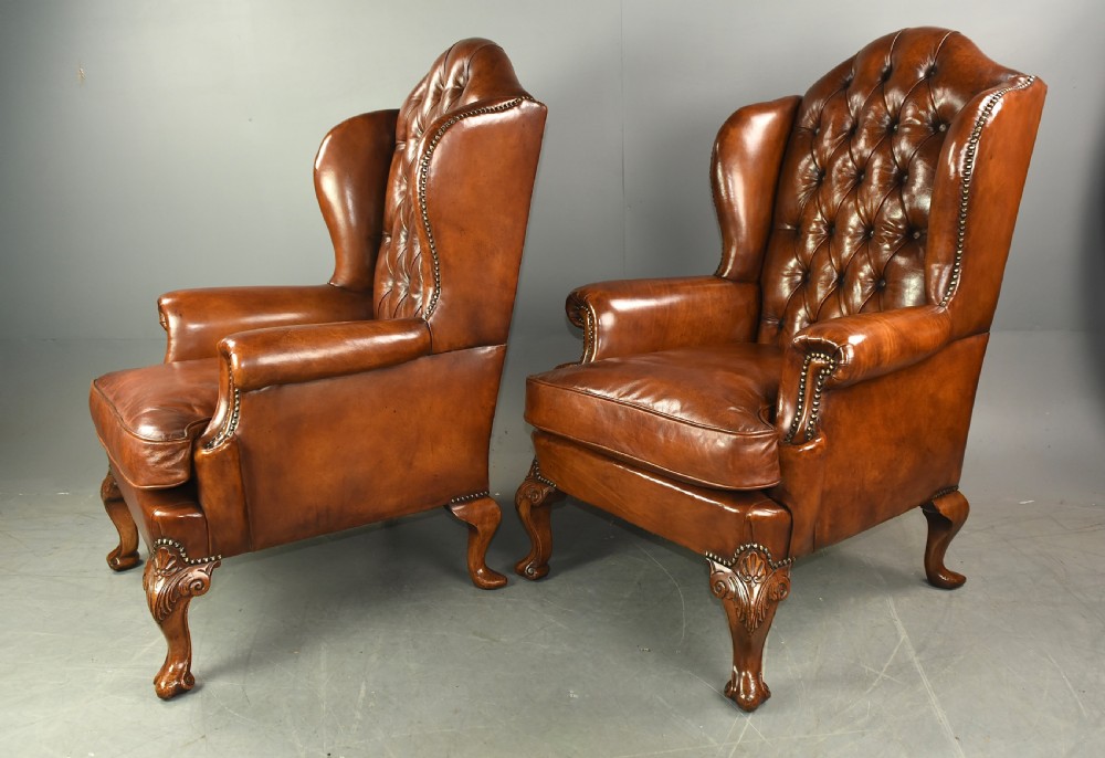 Large pair of leather wing chairs  View III
