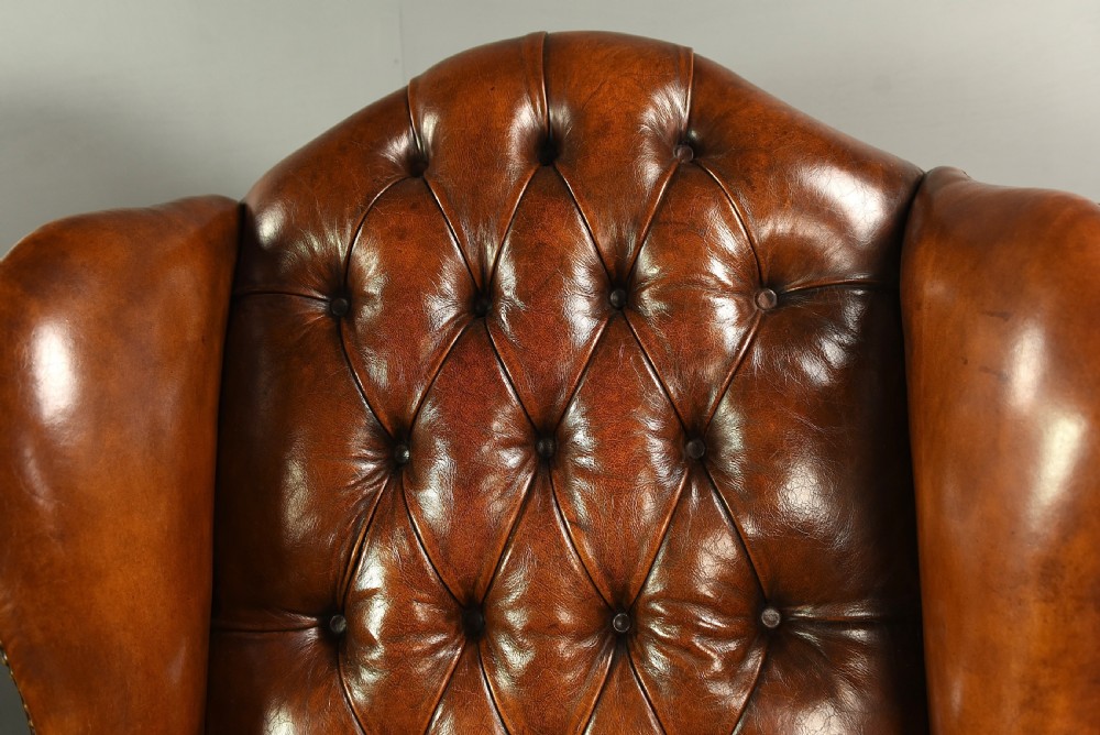 Large pair of leather wing chairs  View V